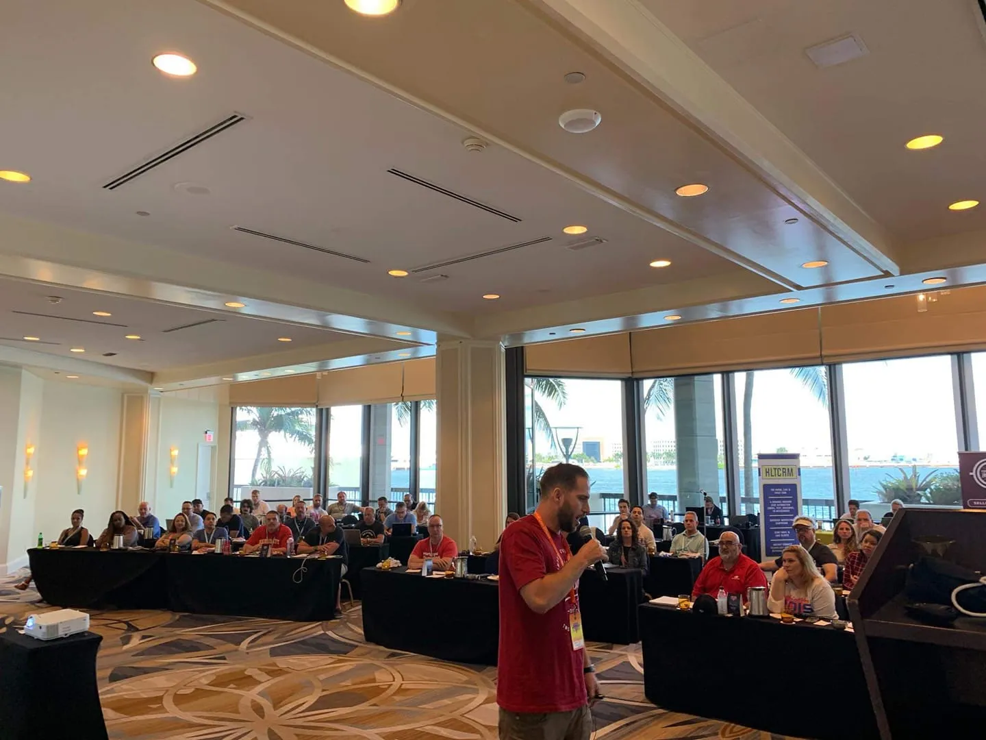 Luke Shankula presenting to a room full of mortgage professionals